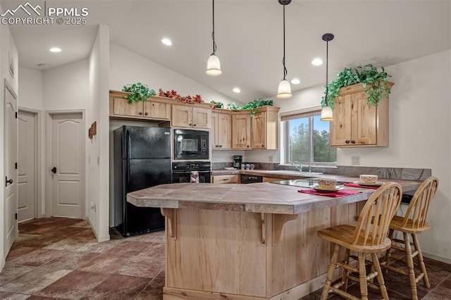 8610 Wildridge Rd, Colorado Springs, CO 80908 - kitchen with black appliances, light brown cabinetry, a peninsula, a kitchen bar, and recessed lighting