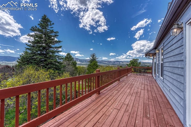 17580 Chipped Arrow Way, Monument, CO 80132 - wooden deck featuring a mountain view