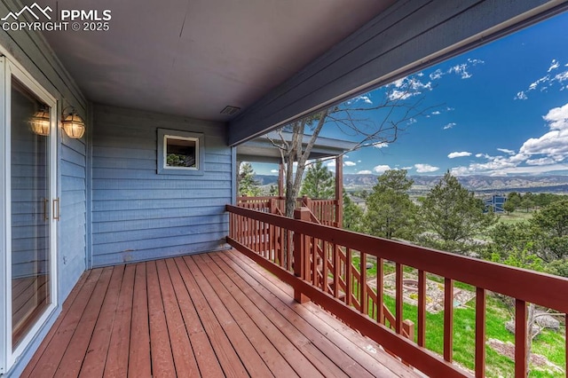 17580 Chipped Arrow Way, Monument, CO 80132 - wooden terrace featuring a mountain view