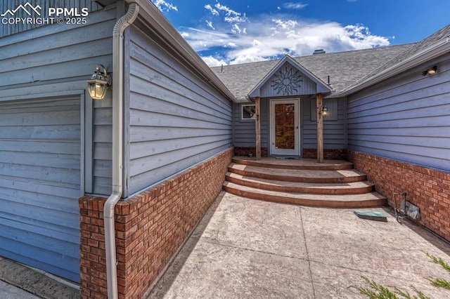 17580 Chipped Arrow Way, Monument, CO 80132 - view of exterior entry featuring brick siding