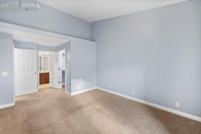 3730 Penny Pt Unit G, Colorado Springs, CO 80906 - unfurnished bedroom with light carpet, baseboards, and ensuite bath