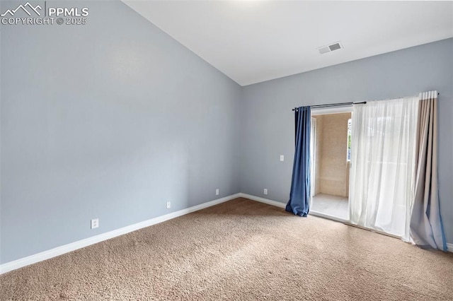3730 Penny Pt Unit G, Colorado Springs, CO 80906 - spare room featuring carpet flooring, baseboards, and vaulted ceiling