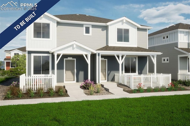 5843 Uptop Pt, Colorado Springs, CO 80927 - rear view of property featuring board and batten siding, a porch, and roof with shingles