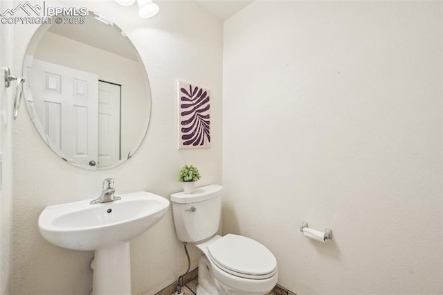 7619 Steward Ln, Colorado Springs, CO 80922 - half bath featuring toilet