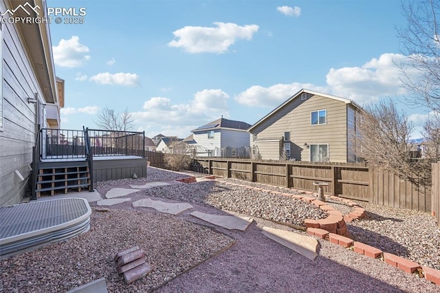 7619 Steward Ln, Colorado Springs, CO 80922 - fenced backyard with a deck