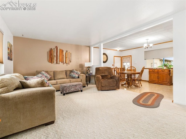 63 Radcliff Ln, Pueblo, CO 81005 - carpeted living room featuring a chandelier