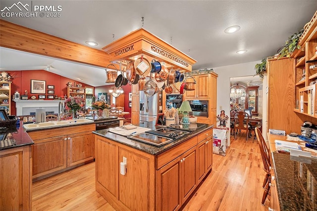 435 W Woodmen Rd, Colorado Springs, CO 80919 - kitchen featuring a chandelier, stovetop with downdraft, built in microwave, light wood-type flooring, and recessed lighting