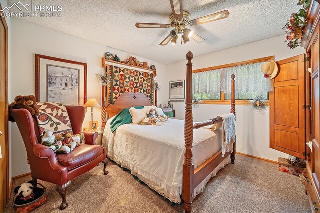 435 W Woodmen Rd, Colorado Springs, CO 80919 - carpeted bedroom with a textured ceiling, ceiling fan, and baseboards