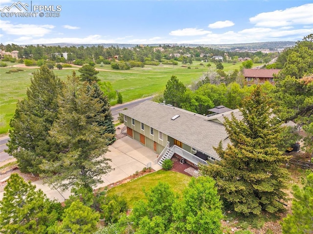 435 W Woodmen Rd, Colorado Springs, CO 80919 - view from above of property with a tree filled landscape