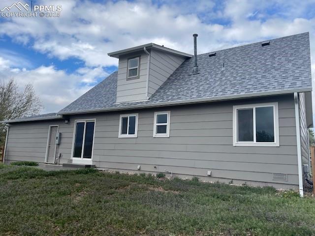 10910 Double D Rd, Fountain, CO 80817 - rear view of property with a lawn and roof with shingles