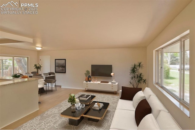 1934 Berkshire Ln, Colorado Springs, CO 80909 - living room featuring light wood-style flooring and baseboards