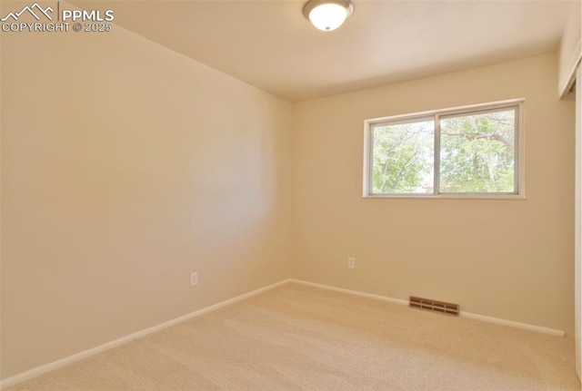 1934 Berkshire Ln, Colorado Springs, CO 80909 - empty room with light carpet and baseboards