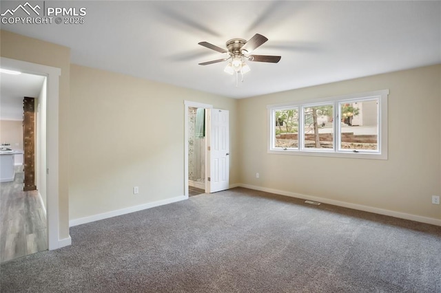 595 Wintery Cir, Colorado Springs, CO 80919 - carpeted empty room with a ceiling fan and baseboards