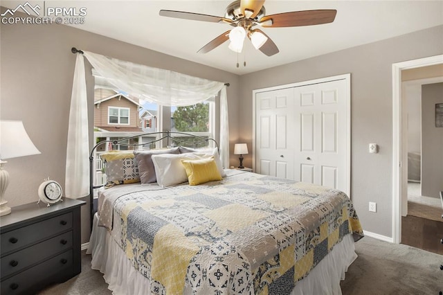 7833 Bengali Ln, Colorado Springs, CO 80923 - bedroom featuring baseboards, dark colored carpet, a closet, and a ceiling fan