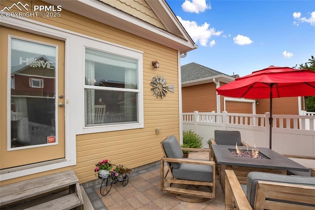 7833 Bengali Ln, Colorado Springs, CO 80923 - view of patio with an outdoor fire pit