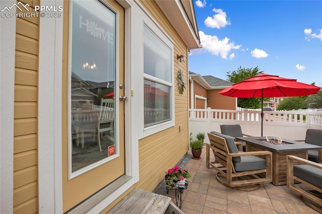 7833 Bengali Ln, Colorado Springs, CO 80923 - view of patio / terrace with a fire pit
