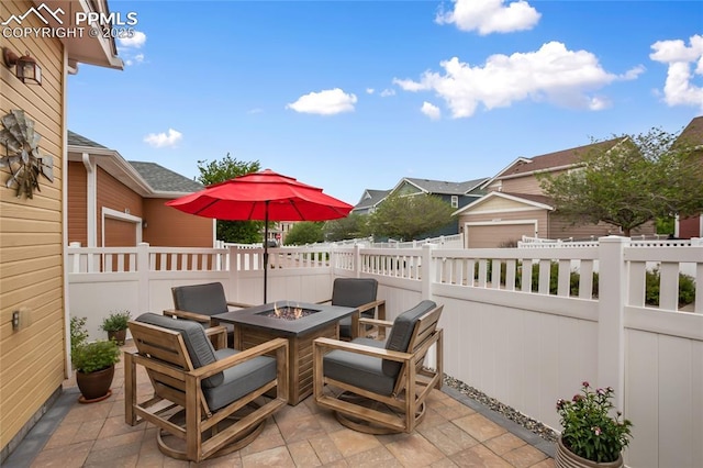 7833 Bengali Ln, Colorado Springs, CO 80923 - view of patio / terrace featuring a fire pit
