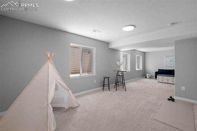 7856 Calabash Rd, Colorado Springs, CO 80908 - game room with carpet flooring and baseboards