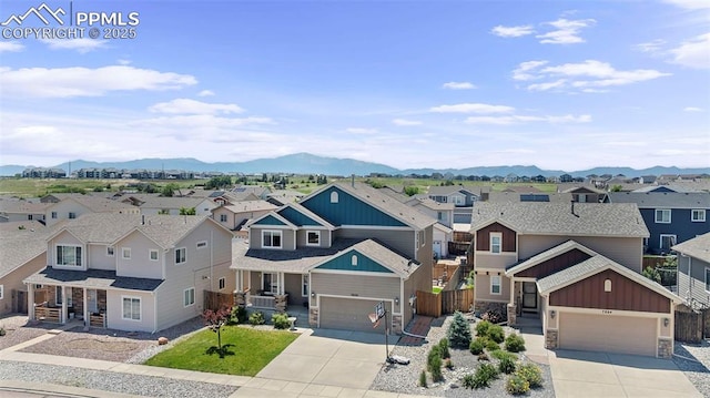 7856 Calabash Rd, Colorado Springs, CO 80908 - view of front of property with a residential view, board and batten siding, and concrete driveway