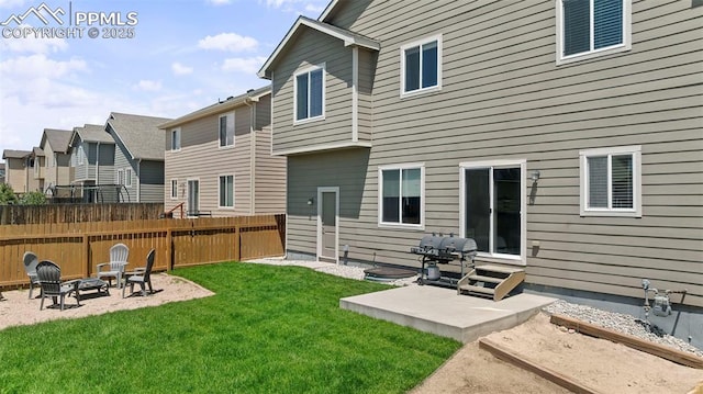 7856 Calabash Rd, Colorado Springs, CO 80908 - back of property featuring a patio, entry steps, a fire pit, and a residential view