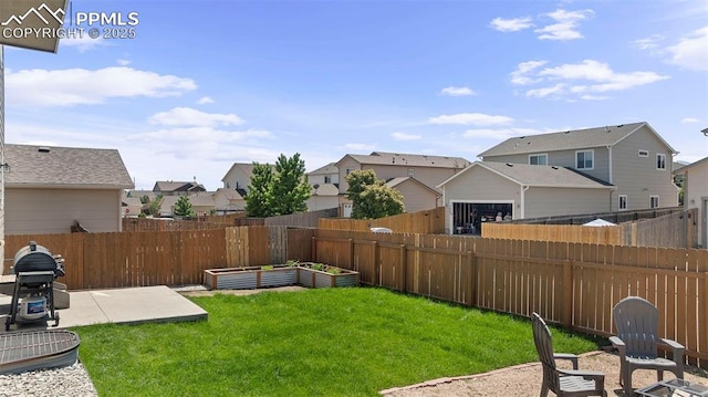 7856 Calabash Rd, Colorado Springs, CO 80908 - fenced backyard featuring a residential view, a garden, and a patio