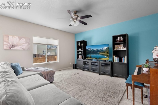 7856 Calabash Rd, Colorado Springs, CO 80908 - carpeted living area featuring a ceiling fan and baseboards