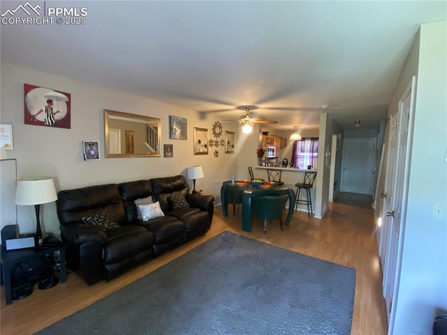 967 Brant Hollow Ct, Colorado Springs, CO 80916 - living room featuring wood finished floors and a ceiling fan