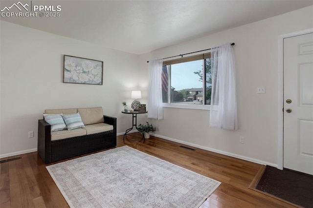 1567 Willshire Dr, Colorado Springs, CO 80906 - living area featuring wood finished floors and baseboards