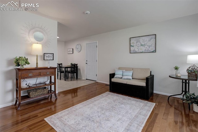 1567 Willshire Dr, Colorado Springs, CO 80906 - living area with wood finished floors, baseboards, and recessed lighting