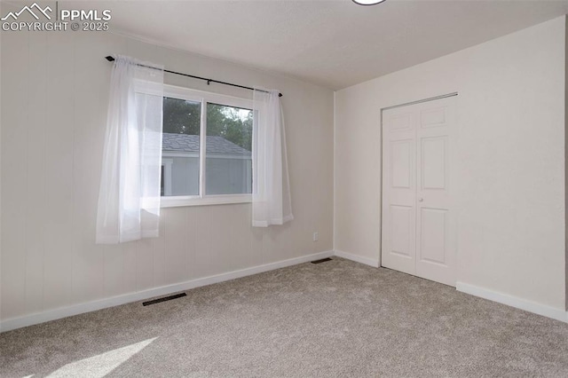 1567 Willshire Dr, Colorado Springs, CO 80906 - empty room featuring carpet and baseboards