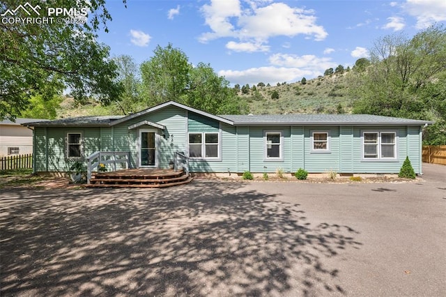 620 Echo Ln, Colorado Springs, CO 80904 - ranch-style home with driveway, a wooden deck, and crawl space