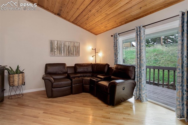 417 W Columbine Ave, Woodland Park, CO 80863 - living area featuring lofted ceiling, light wood finished floors, wooden ceiling, and baseboards