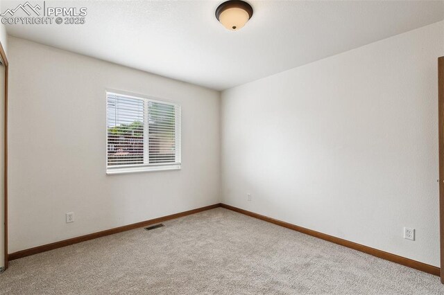 5630 Almont Ave, Colorado Springs, CO 80911 - empty room with carpet flooring and baseboards
