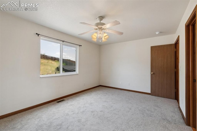 5630 Almont Ave, Colorado Springs, CO 80911 - unfurnished room with carpet floors, ceiling fan, baseboards, and a smoke detector