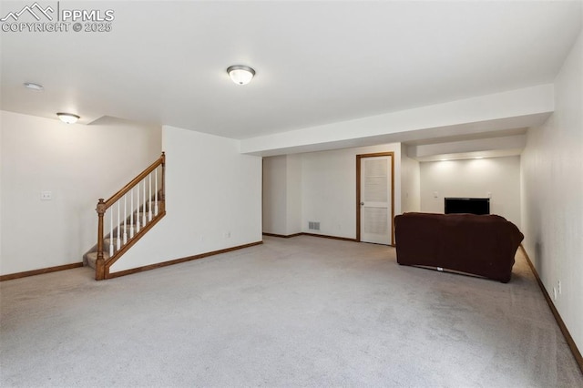 5630 Almont Ave, Colorado Springs, CO 80911 - finished basement with carpet, baseboards, and stairs