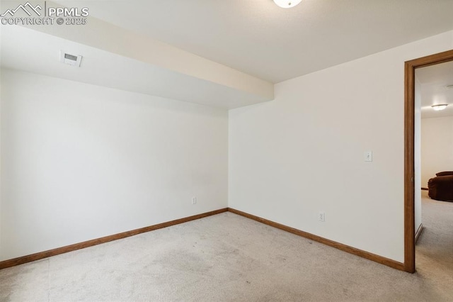 5630 Almont Ave, Colorado Springs, CO 80911 - spare room featuring light carpet and baseboards