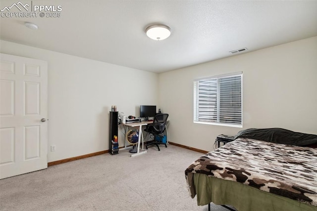 5630 Almont Ave, Colorado Springs, CO 80911 - bedroom featuring baseboards, carpet floors, and an office area