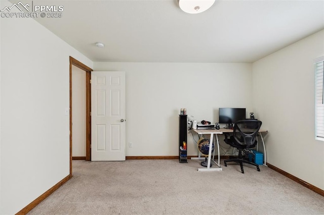 5630 Almont Ave, Colorado Springs, CO 80911 - carpeted home office featuring baseboards