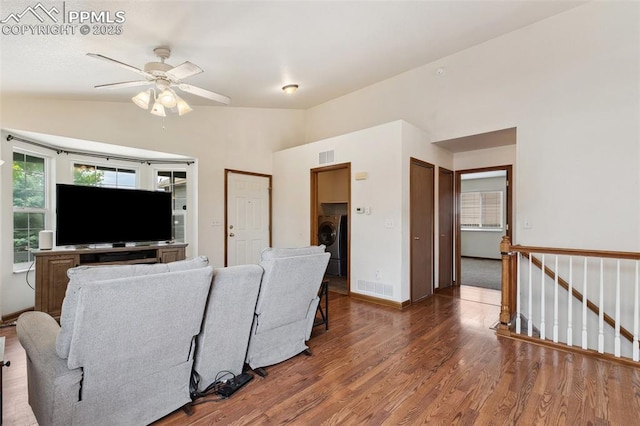 5630 Almont Ave, Colorado Springs, CO 80911 - living area with washer / dryer, lofted ceiling, wood finished floors, a ceiling fan, and baseboards