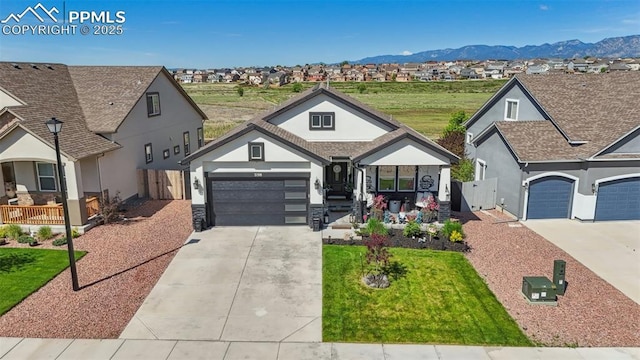 7198 Bigtooth Maple Dr, Colorado Springs, CO 80925 - view of front of home with driveway, stucco siding, and an attached garage