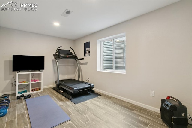 12912 Fishers Island Rd, Peyton, CO 80831 - exercise area featuring baseboards, wood finish floors, and recessed lighting