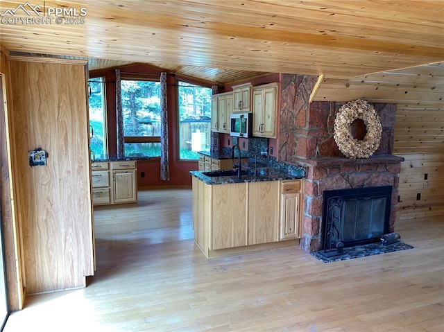 845 Markus Rd, Woodland Park, CO 80863 - kitchen featuring stainless steel microwave, vaulted ceiling, wood ceiling, light wood-style flooring, and light brown cabinetry