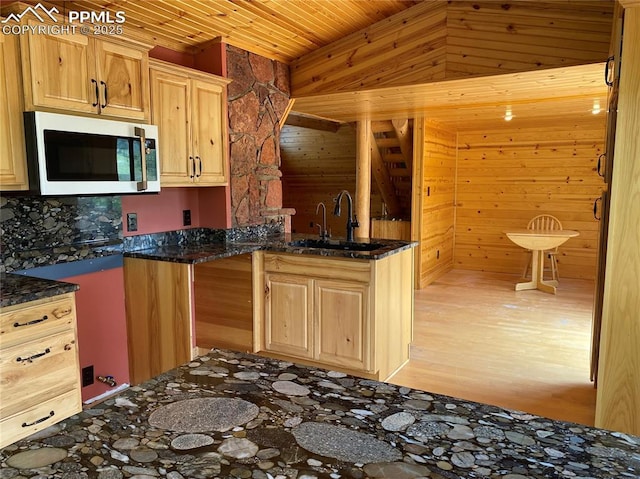 845 Markus Rd, Woodland Park, CO 80863 - kitchen featuring white microwave, wooden ceiling, a sink, wooden walls, and vaulted ceiling