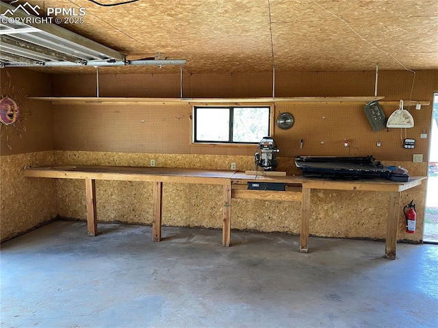845 Markus Rd, Woodland Park, CO 80863 - garage featuring a workshop area