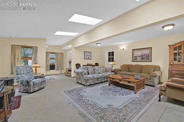 751 Crown Ridge Dr, Colorado Springs, CO 80904 - living area with carpet and a skylight