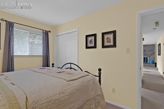751 Crown Ridge Dr, Colorado Springs, CO 80904 - bedroom featuring carpet flooring, a closet, and baseboards