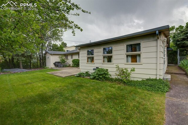 751 Crown Ridge Dr, Colorado Springs, CO 80904 - rear view of property featuring a patio