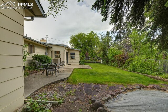 751 Crown Ridge Dr, Colorado Springs, CO 80904 - view of yard featuring a patio