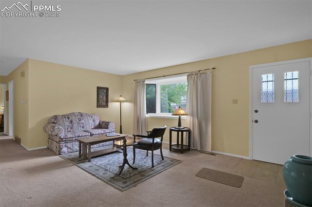 751 Crown Ridge Dr, Colorado Springs, CO 80904 - carpeted living area featuring baseboards