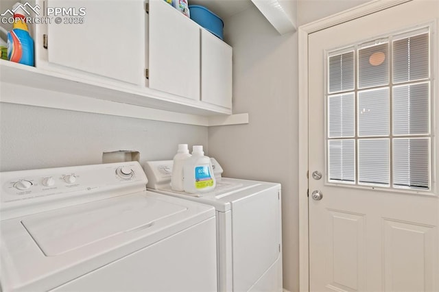 3870 Chinawood Ct, Colorado Springs, CO 80918 - laundry area featuring independent washer and dryer and cabinet space